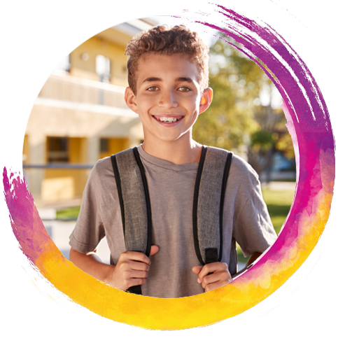 Child smiling wearing contact lenses